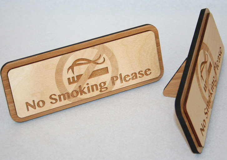 No Smoking Sign engraved on Birch Wood with a Bamboo stand